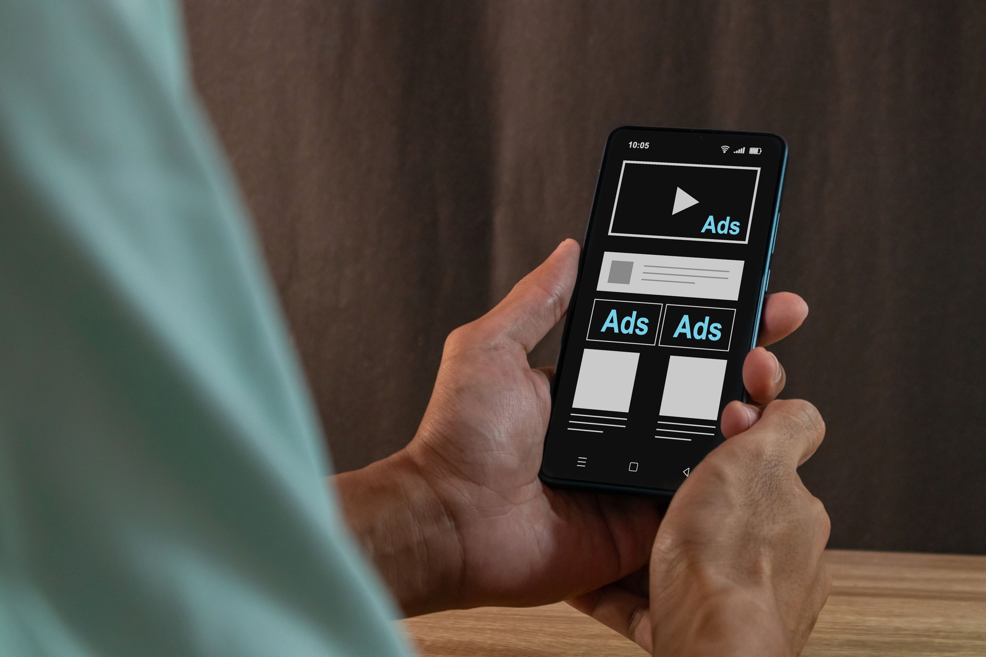 Advertising media on smartphone. Digital marketing strategy concept. Man seeing an advertisement on social media on his smartphone.