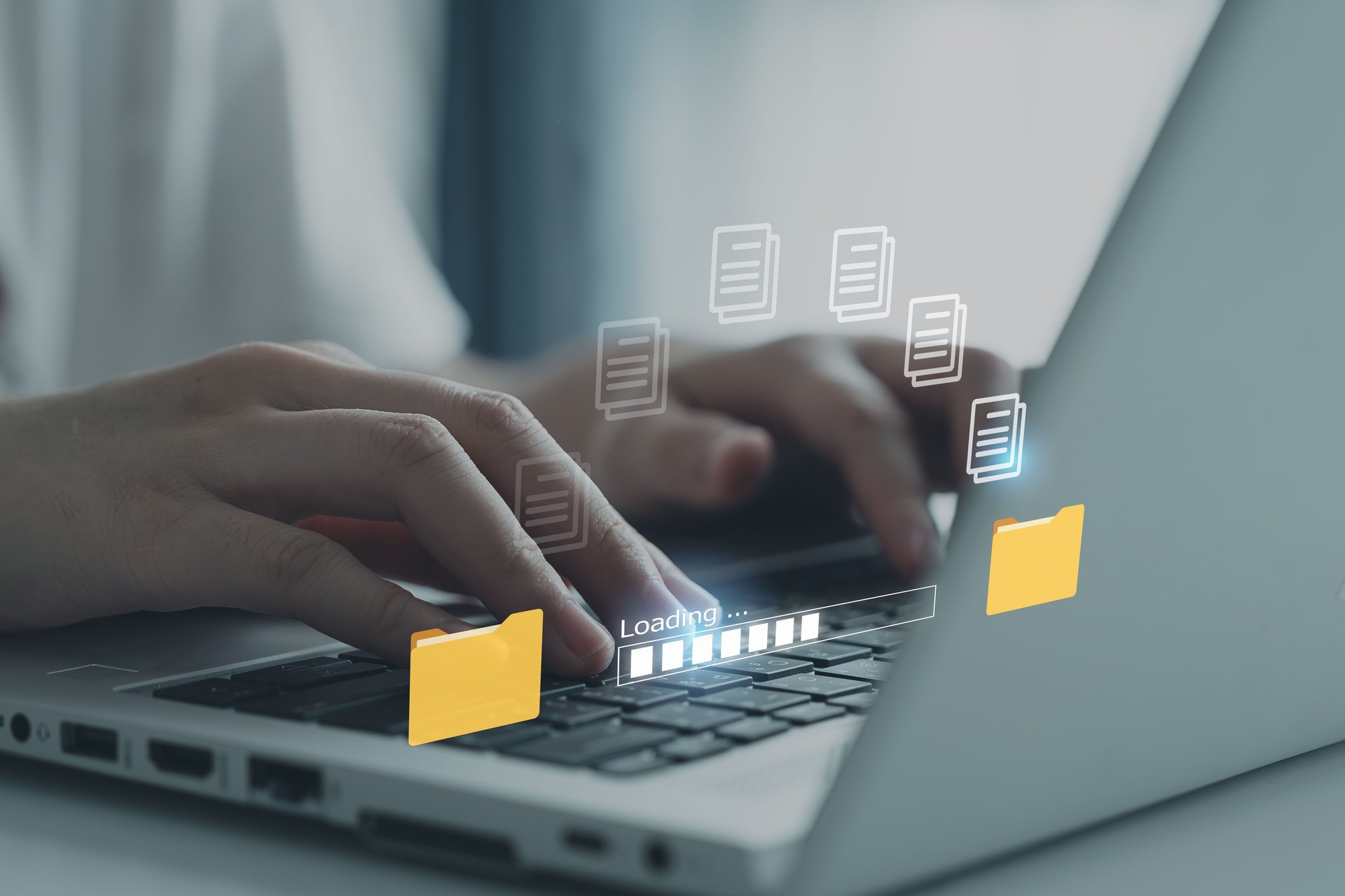 Hands typing on keyboard computer laptop for send document on internet. Data migration, Transfer file between folder, Backup data, Exchange file, DMS. Virtual document loading to another folder.